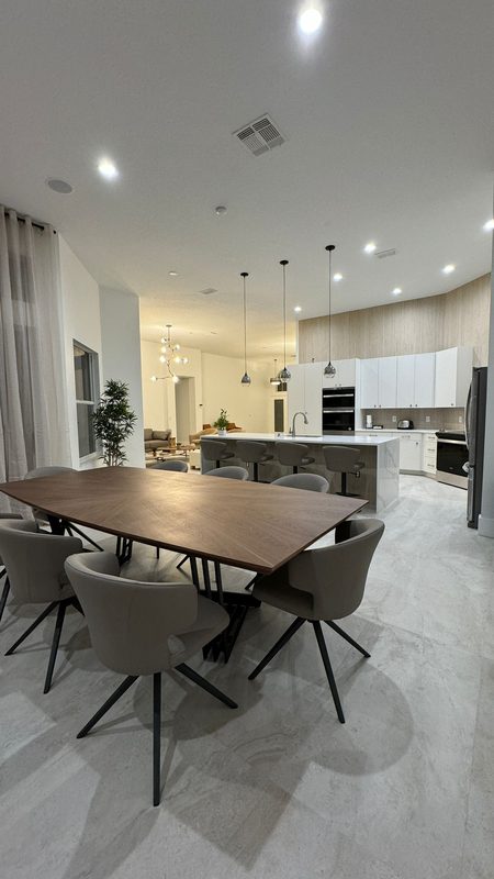 Refined kitchen and dining with custom cabinetry