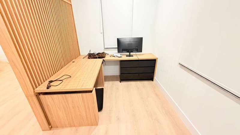 Modern office with custom wood cabinetry