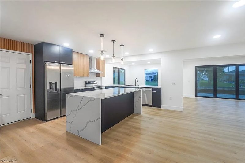 Contemporary kitchen with custom island cabinetry