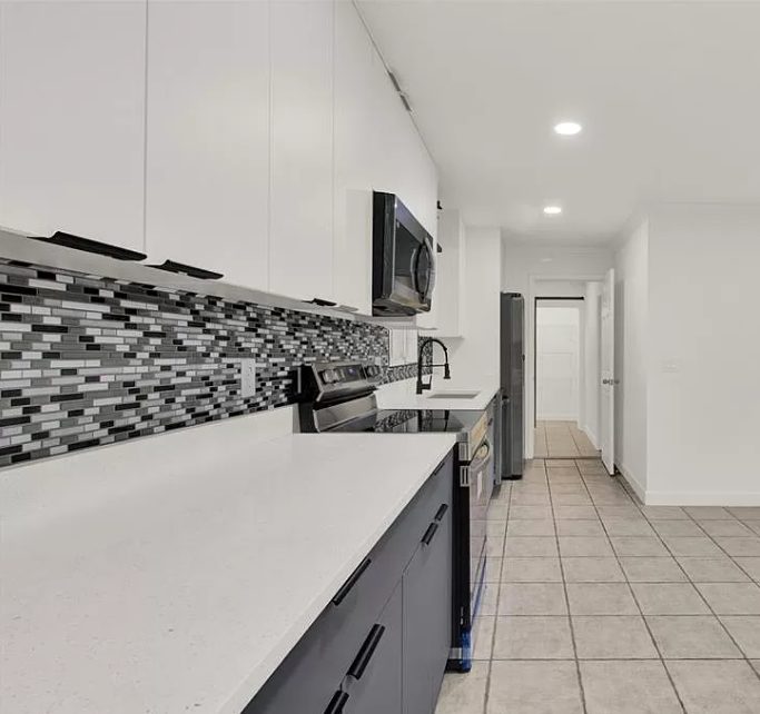 Contemporary Kitchen with Custom Two-Tone Cabinetry