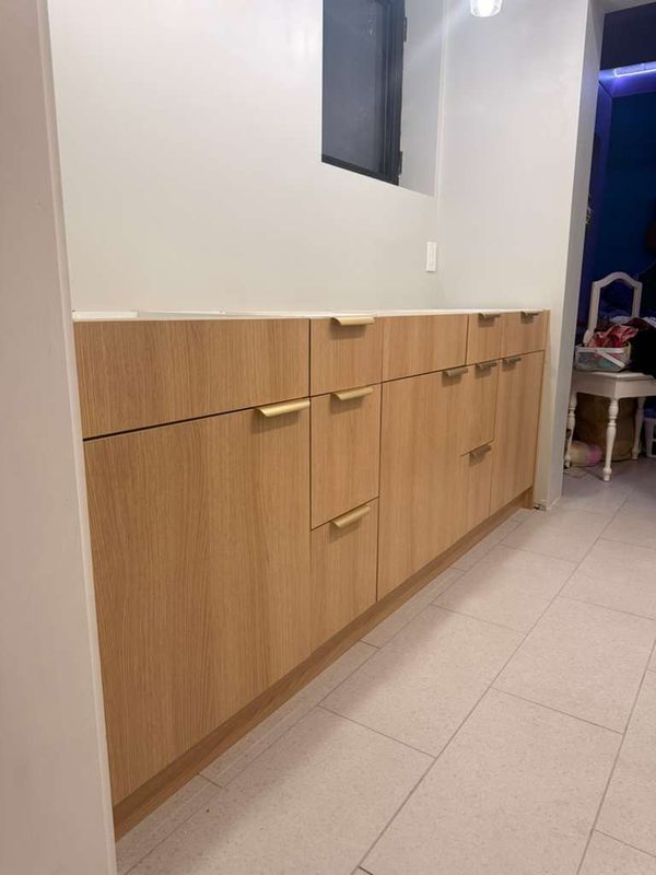 Custom cabinetry in warm oak finish