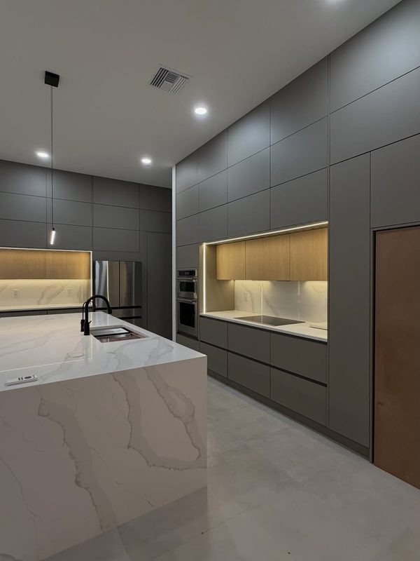 Modern kitchen with illuminated cabinetry