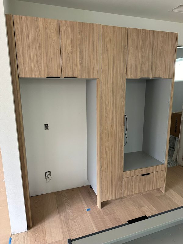 Upscale closet with custom cabinetry