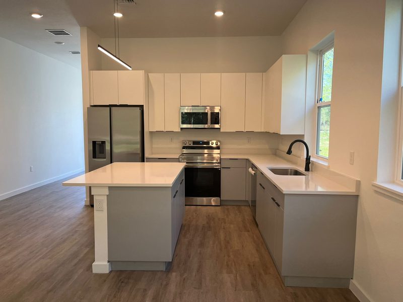 Contemporary Kitchen with Custom Cabinetry and Island