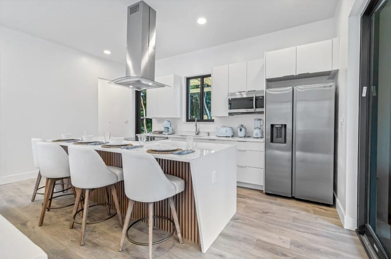 Contemporary kitchen with custom island cabinetry