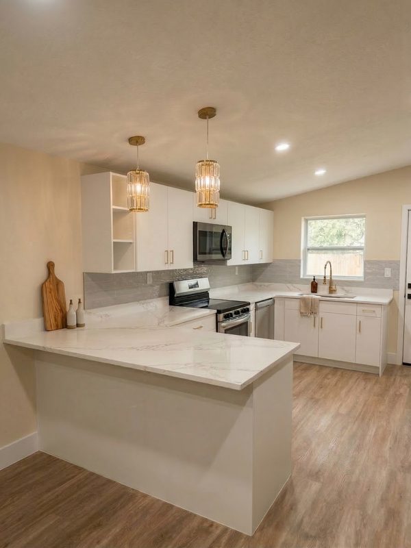 Modern kitchen with custom white cabinetry