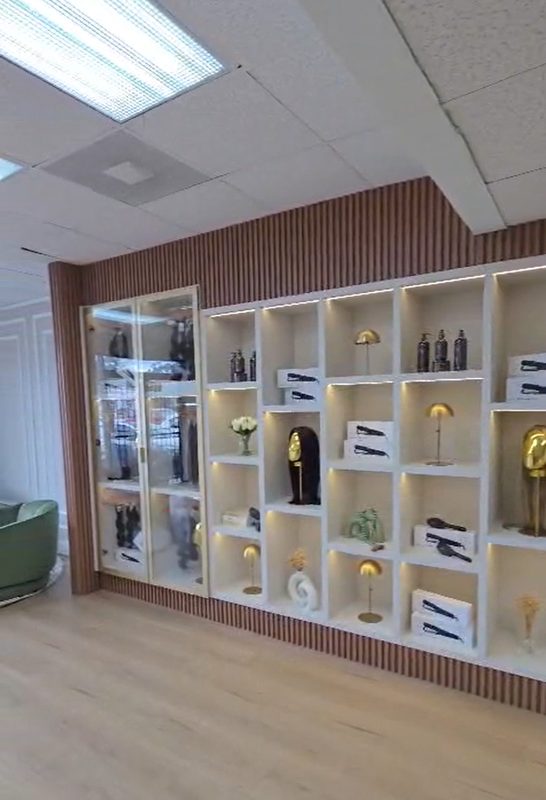 Luxury retail showroom with illuminated display shelving