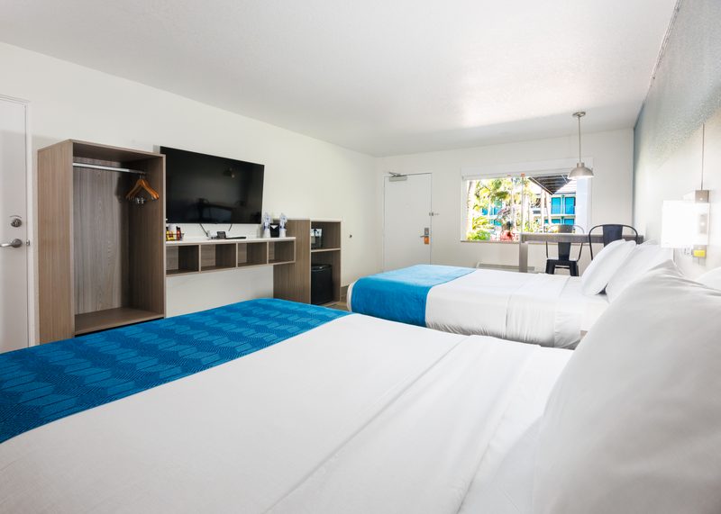 Modern hotel suite with integrated millwork