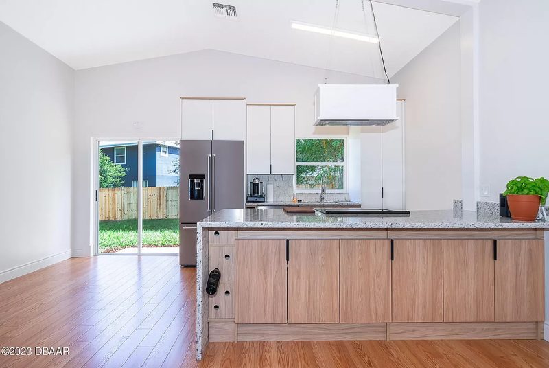 Contemporary kitchen with custom wood cabinetry