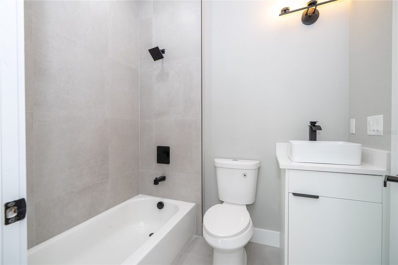 Modern bathroom with frameless glass enclosure